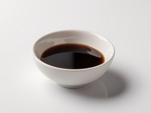 精致意式浓缩咖啡杯，深色液体表面有细腻泡沫，背景是简约白色桌面